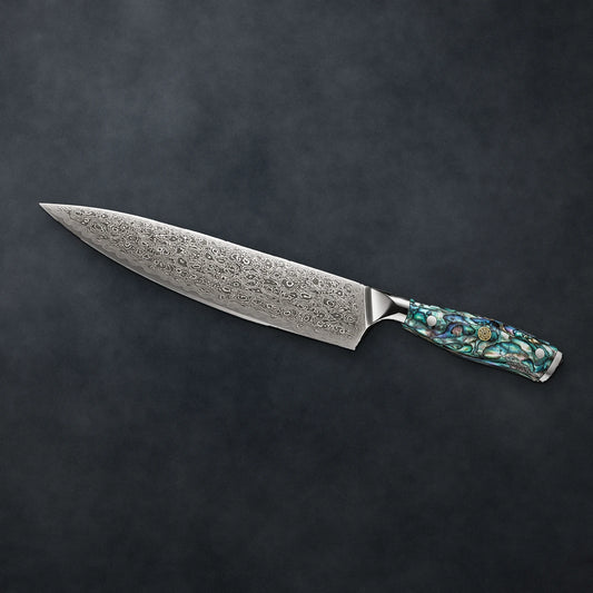 The Abalone chef knife on dark slate
